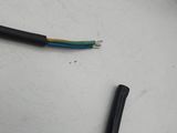 a black and green wire is connected to a black and white wire