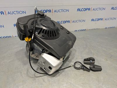 a black and white photo of a blower with a cord attached