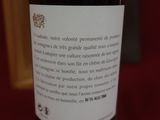 a bottle of wine that is sitting on a table