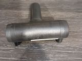 an image of a metal object on a wooden table