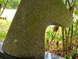 a stone sculpture of a horse head on top of a stone block