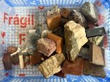 a basket full of rocks and stones in it