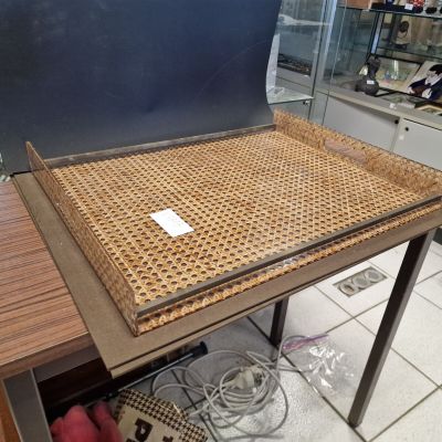 a table with a basket on top of it in a store