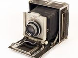 an old camera that is sitting on a table