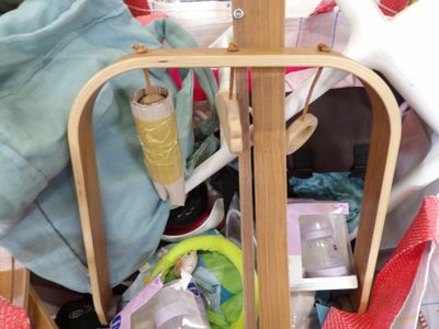 a basket full of items that are sitting on the floor