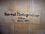 the label on the back of a wooden barrel of wine