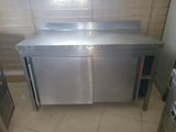 a stainless steel counter in a commercial kitchen