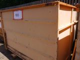 a dumpster that has a price tag on the side of it
