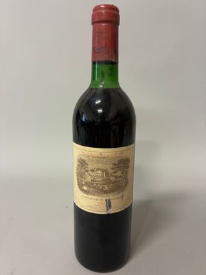 a bottle of wine that is sitting on a table