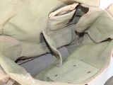 a close up of a bag with a knife inside of it