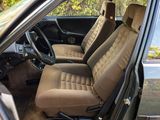 a picture of the inside of a car with the seat covers down