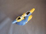 a small toy airplane that is sitting on a table