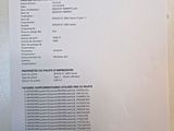 a sheet of paper with information on it on the wall