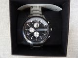 a watch that is in a box on a table