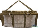 an image of a baby crib with a mesh bag attached to it