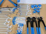 a lot of tools that are laying out on the table
