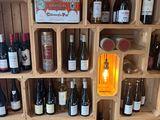 many bottles of wine on the shelves in the room