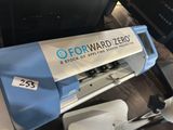 a picture of a blue and white machine with a sign on it