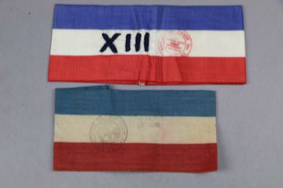 two pieces of cloth with different colors on them on a table
