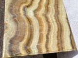 two pieces of wood are stacked on top of each other