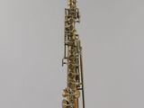 a saxophone hanging from the ceiling in the room