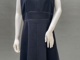 an image of a mannequin dressed in a black dress