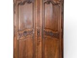 an old wooden armoire with carvings and carvings on the doors