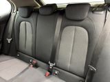 the back seats of a car with two rows of seats in it