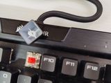a close up of a computer keyboard with a mouse on it