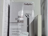 a box of shaving on a shelf next to a box of razors