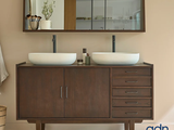 two sinks and a mirror in a bathroom