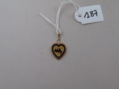 a small gold heart with a heartbeat on it and a price tag