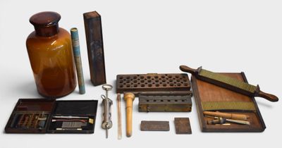 a lot of tools that are sitting on a table