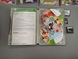 a video game on the table next to a game case