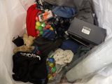 a bag full of clothes and a laptop in it