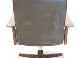 brown leather office chair with wooden arms and casteors