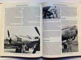 an open book with a picture of a man standing next to an airplane