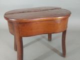 a small wooden table with a wooden top on a white background