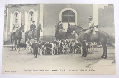 a lot of people that are riding horses in front of a building