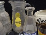 many different types of glassware on the table