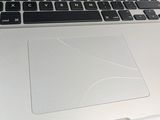 a close up of a laptop with a broken keyboard