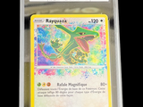 a close up of a pokemon card in a plastic case