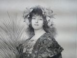 portrait of a woman in a kimono with a palm tree in the background