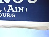 a blue and white sign that says sarroue de pain in french