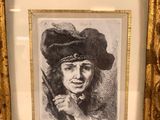 framed drawing of a man in a hat with a cane