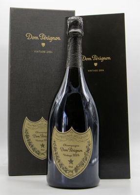 the bottle of champagne is next to a black box