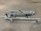 a couple of metal tools that are on the ground