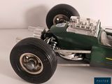 a model of a racing car on display on a table