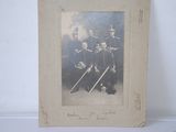 an old photo of a group of men in uniform posing for a picture