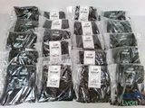 many bags of chocolate sitting on a table